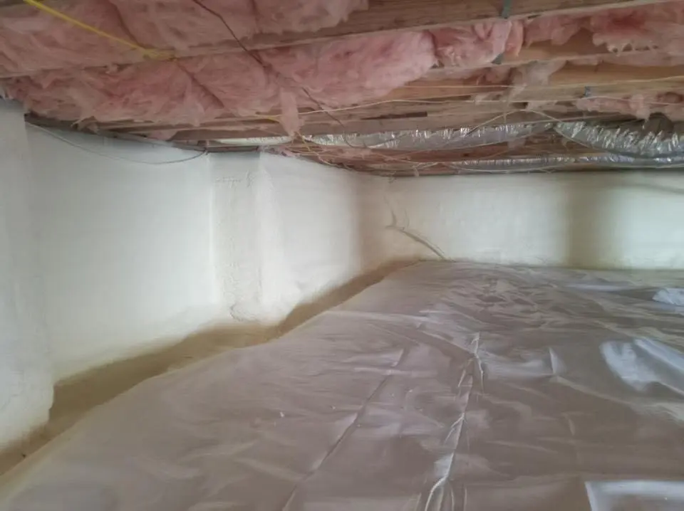 Crawl space encapsulation with closed-cell spray foam for Commercial Roof Restoration in Brookside